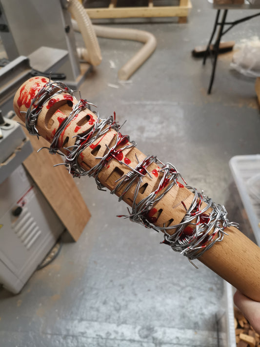 addition of carved text to Lucille bat